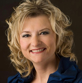 Professional headshot of chiropractor Michelle Schwartz-Webb